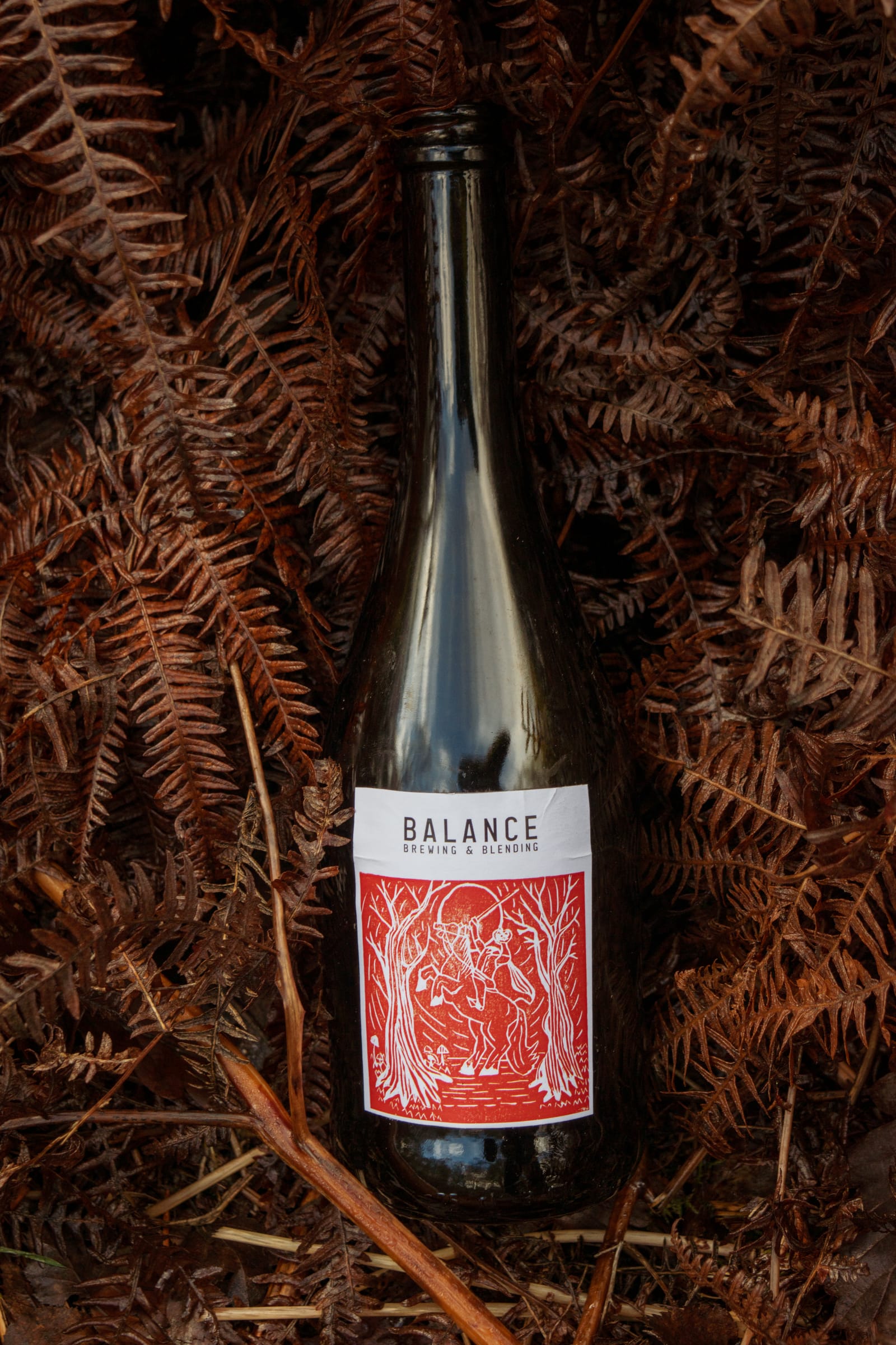 Old Crockern lino print label design — Dartmoor spirit carved from single lino block